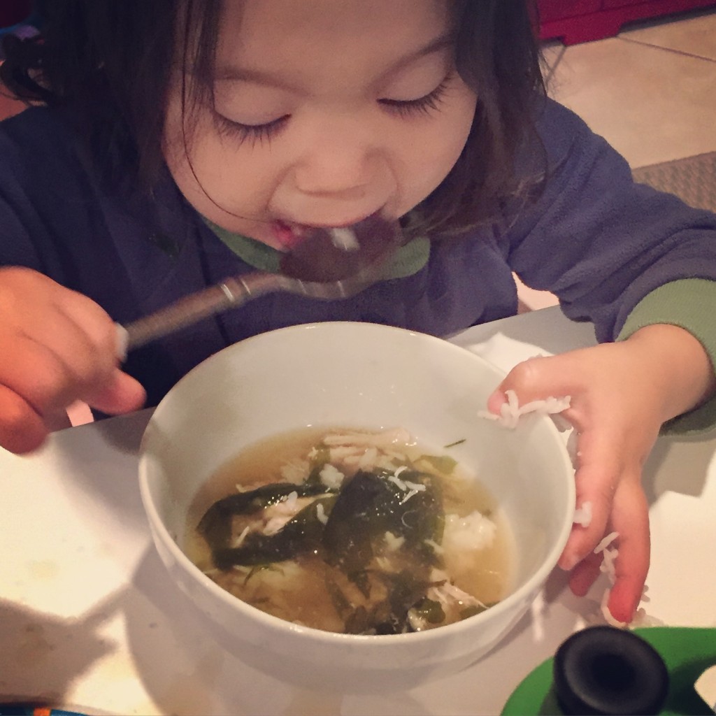kid eating KOREAN SEAWEED SOUP 