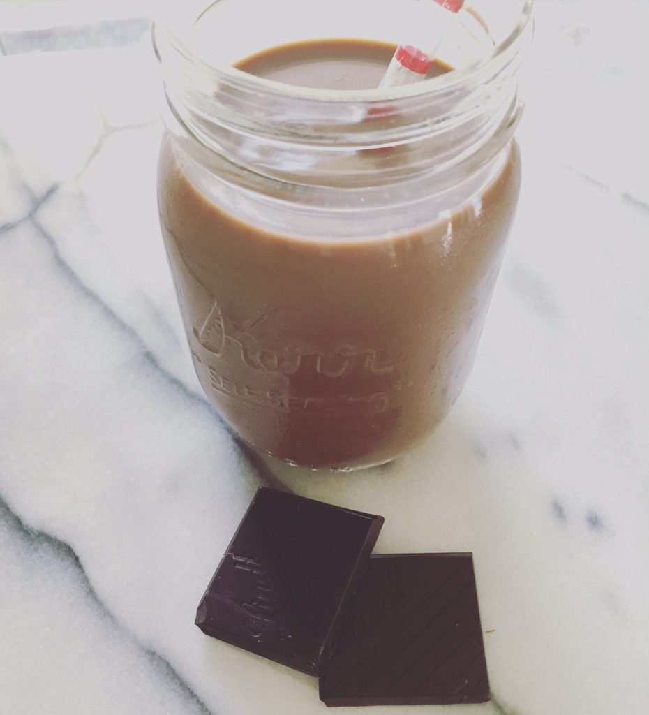 post-workout chocolate drink on a mason jar