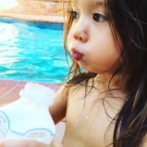 kid drinking camel milk 