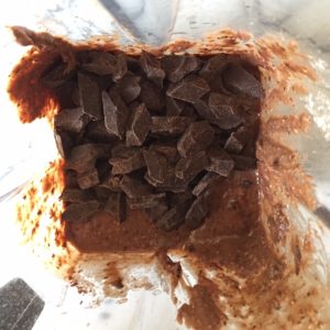 mixing wet ingredients and chocolate for GLUTEN-FREE BLACK BEAN BROWNIES