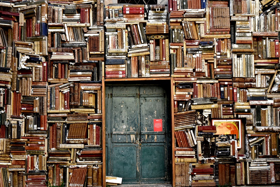 stack of books for Bucket List Books To Read Before You Die