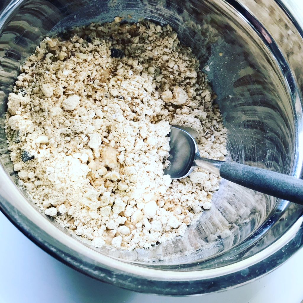 CREATION NATION PROTEIN BAR MIX in a tin bowl