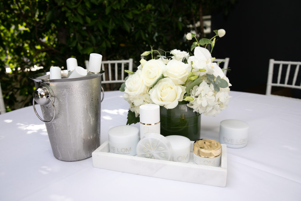 an array of flowers on a white white