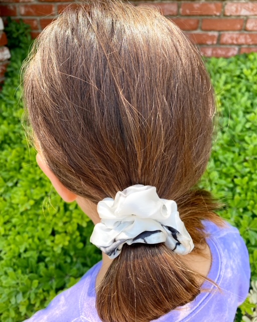 kid using satin scrunchies 